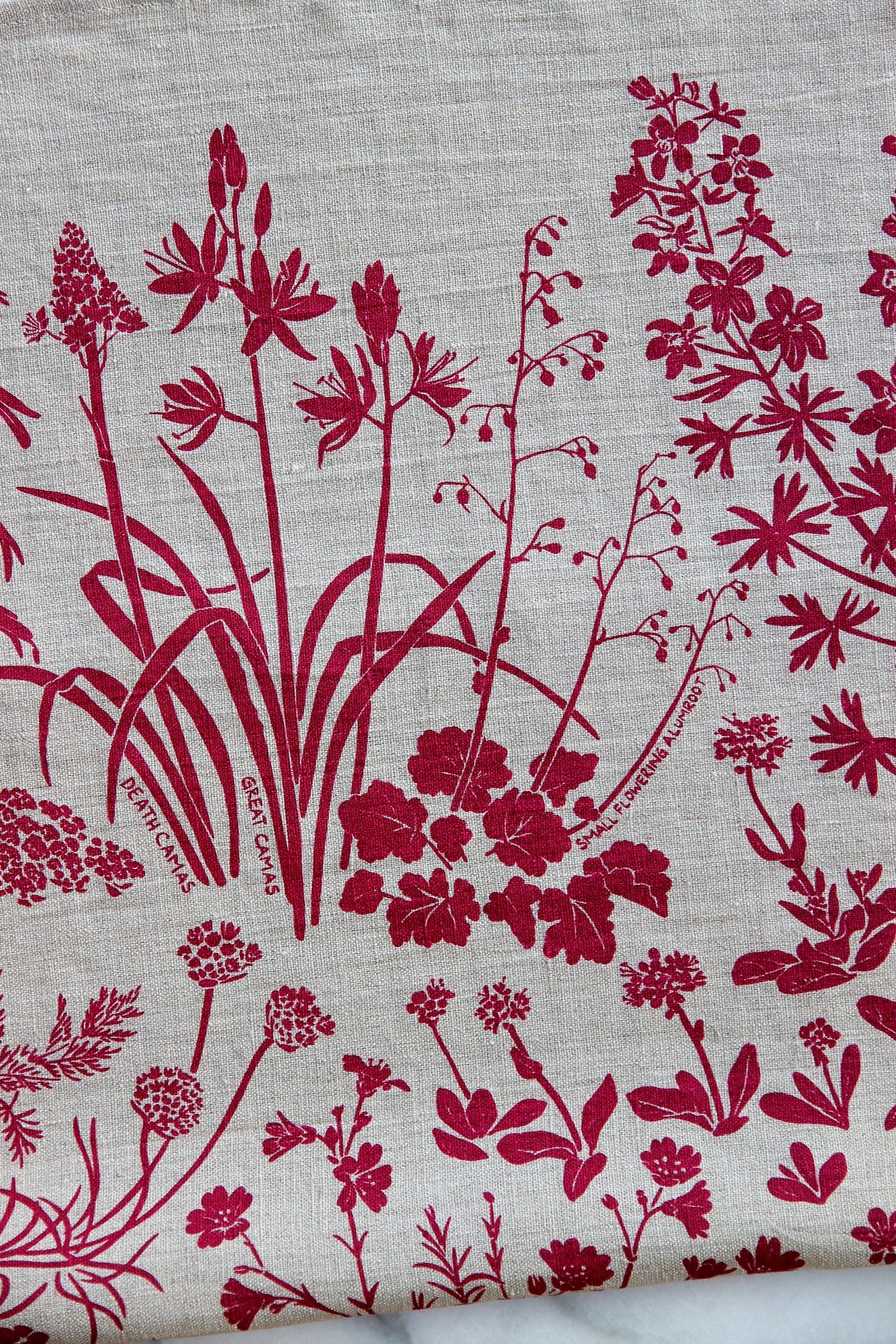 Rocky Outcropping Wildflowers in Plum Jam on Natural Linen