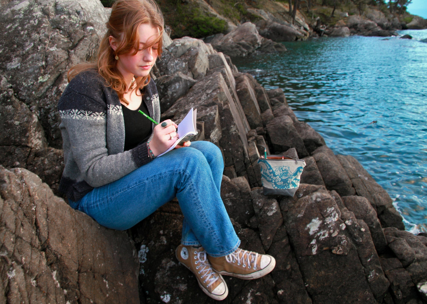 the multi-use pouch may be used by artists for pencils, etc