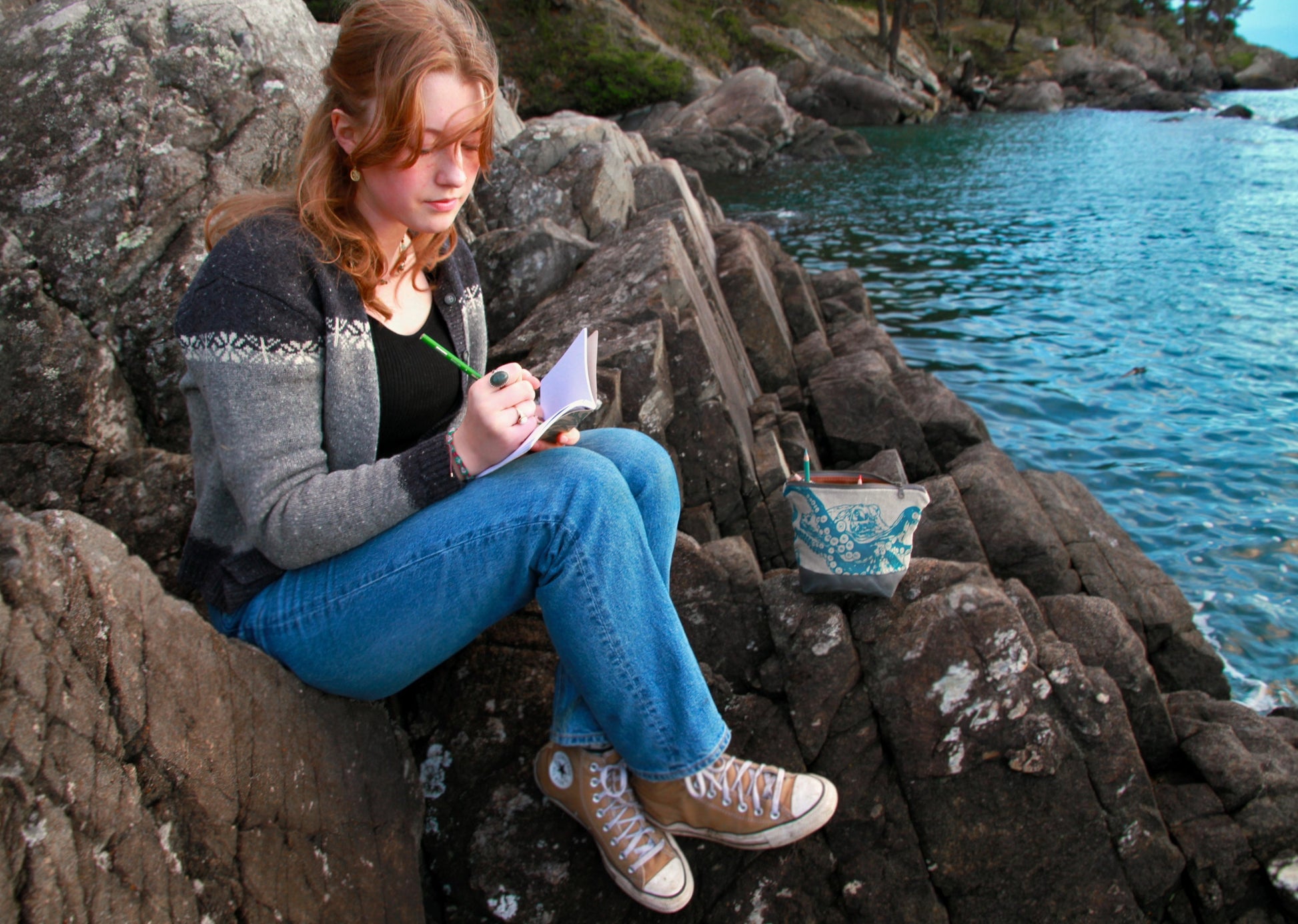 the multi-use pouch may be used by artists for pencils, etc