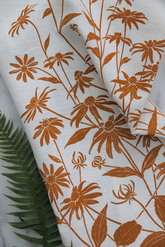 Black Eyed Susan Kitchen Towel in Cider on White Linen