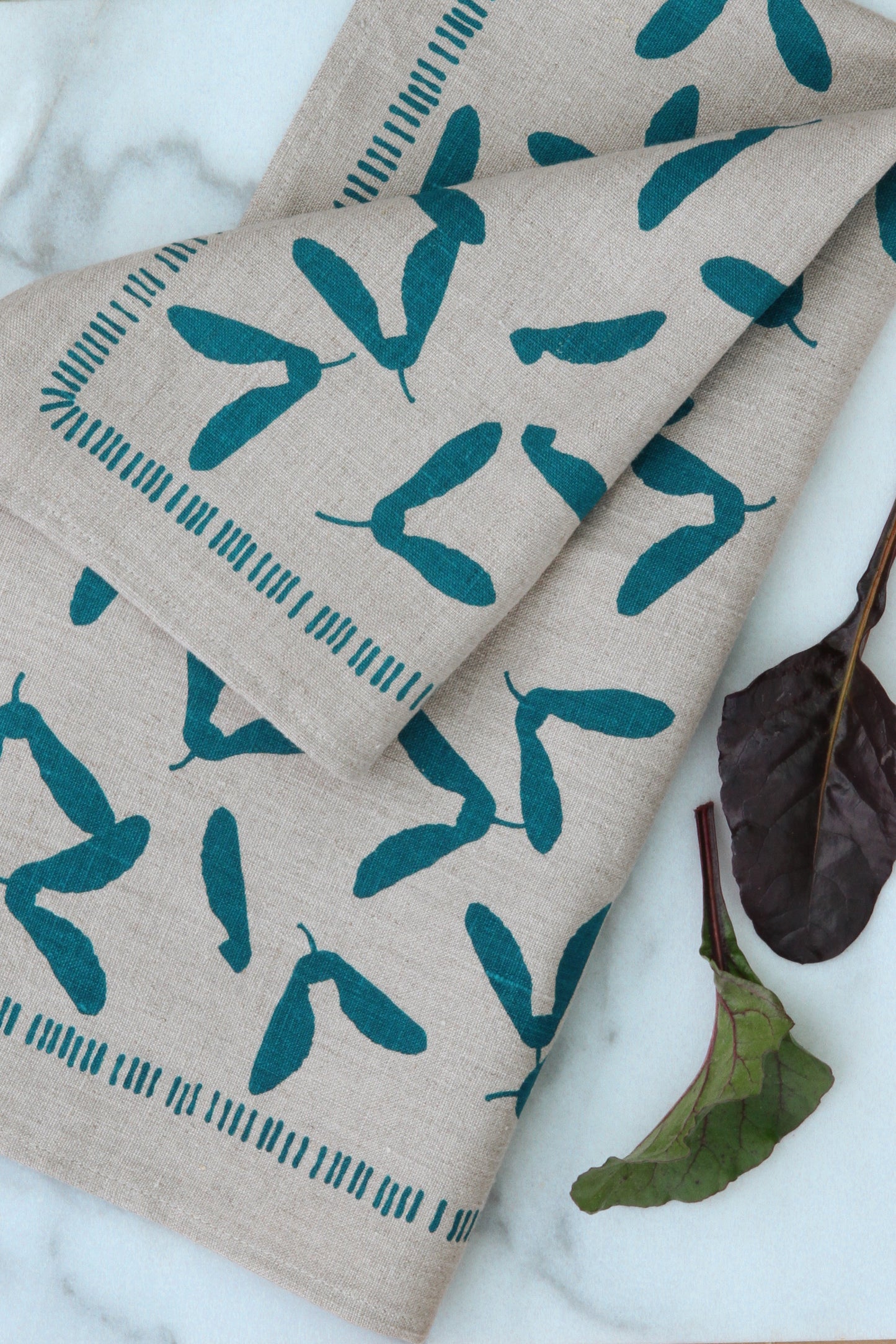 Samara Kitchen Towel in Pool on Natural Linen