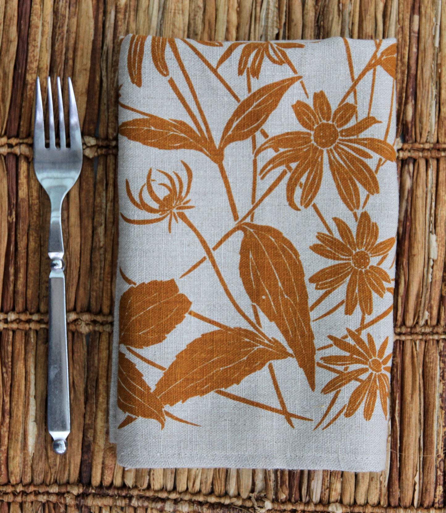 Black Eyed Susan Napkin in Cider on Natural Flax Linen