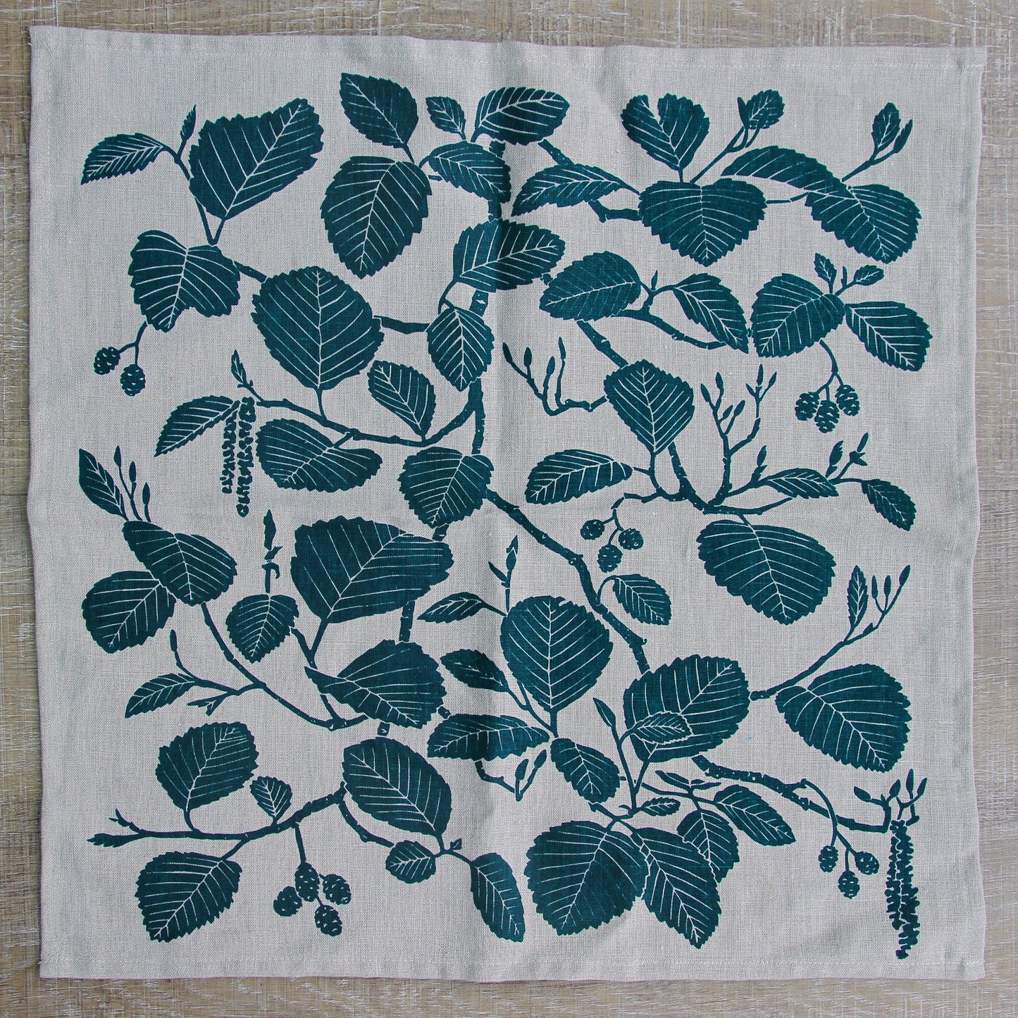 Alder Napkin in Peacock on Natural Linen