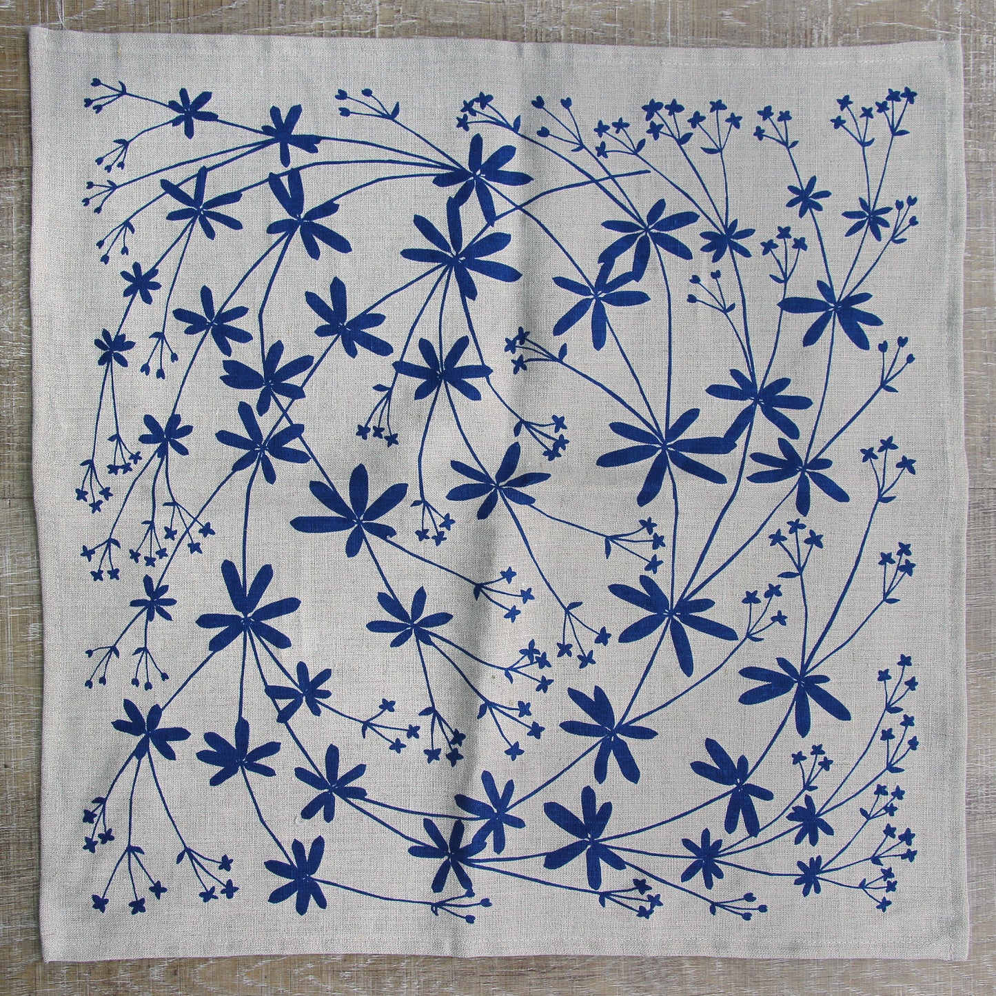 Bedstraw Napkin in Cornflower on Natural Linen