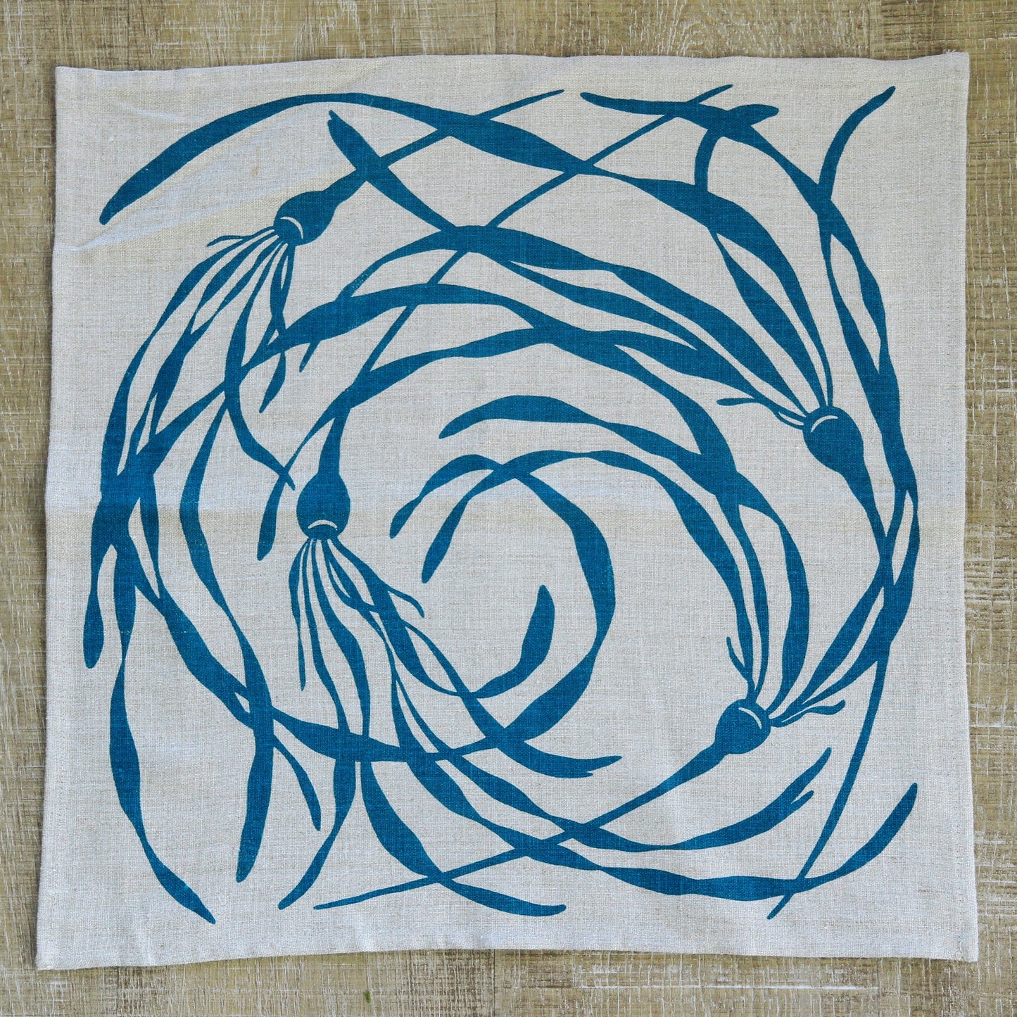 Kelp Napkin in Pool on Natural Flax Linen