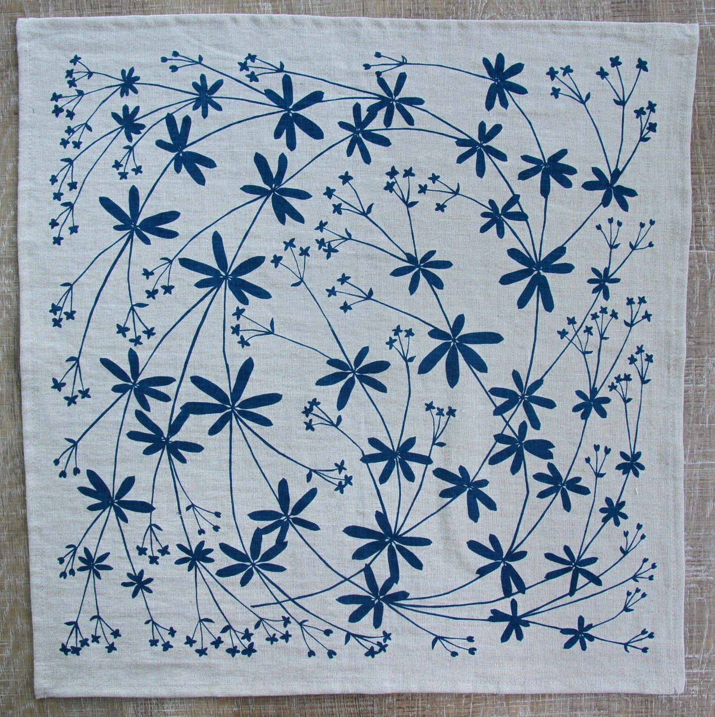 Bedstraw Napkin in Deep Marine on Natural Linen