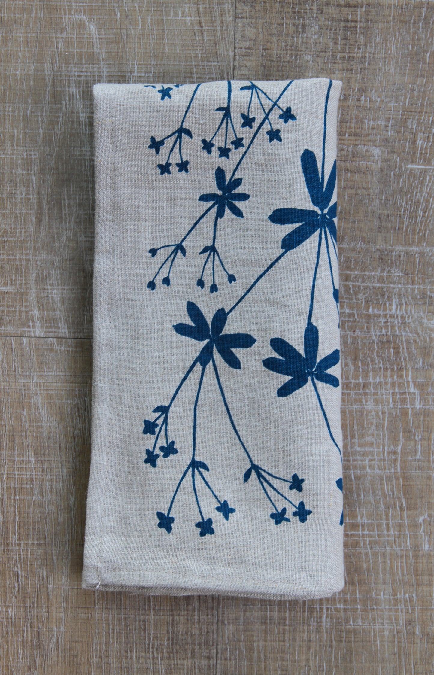 Bedstraw Napkin in Deep Marine on Natural Linen