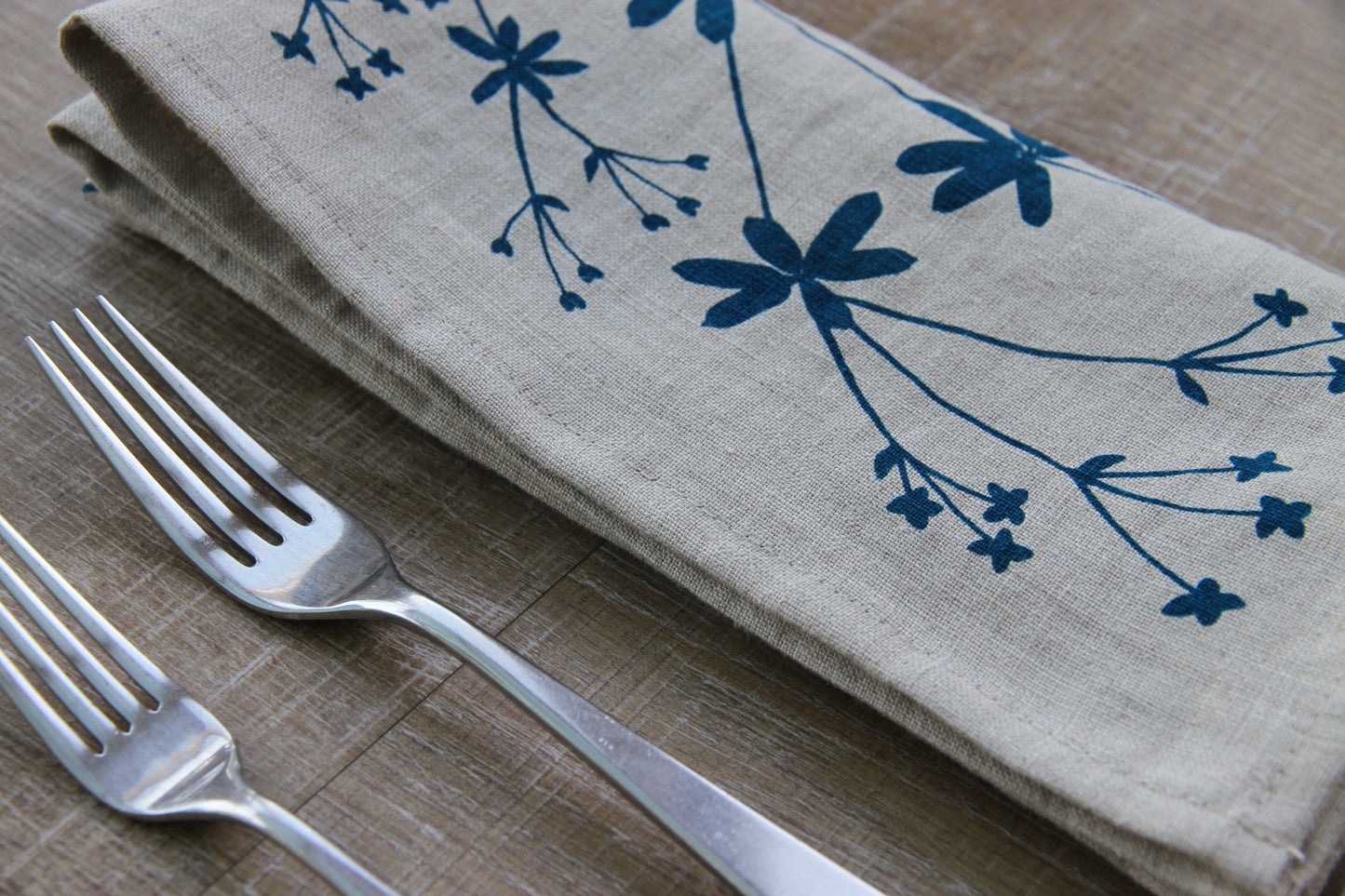 Bedstraw Napkin in Deep Marine on Natural Linen