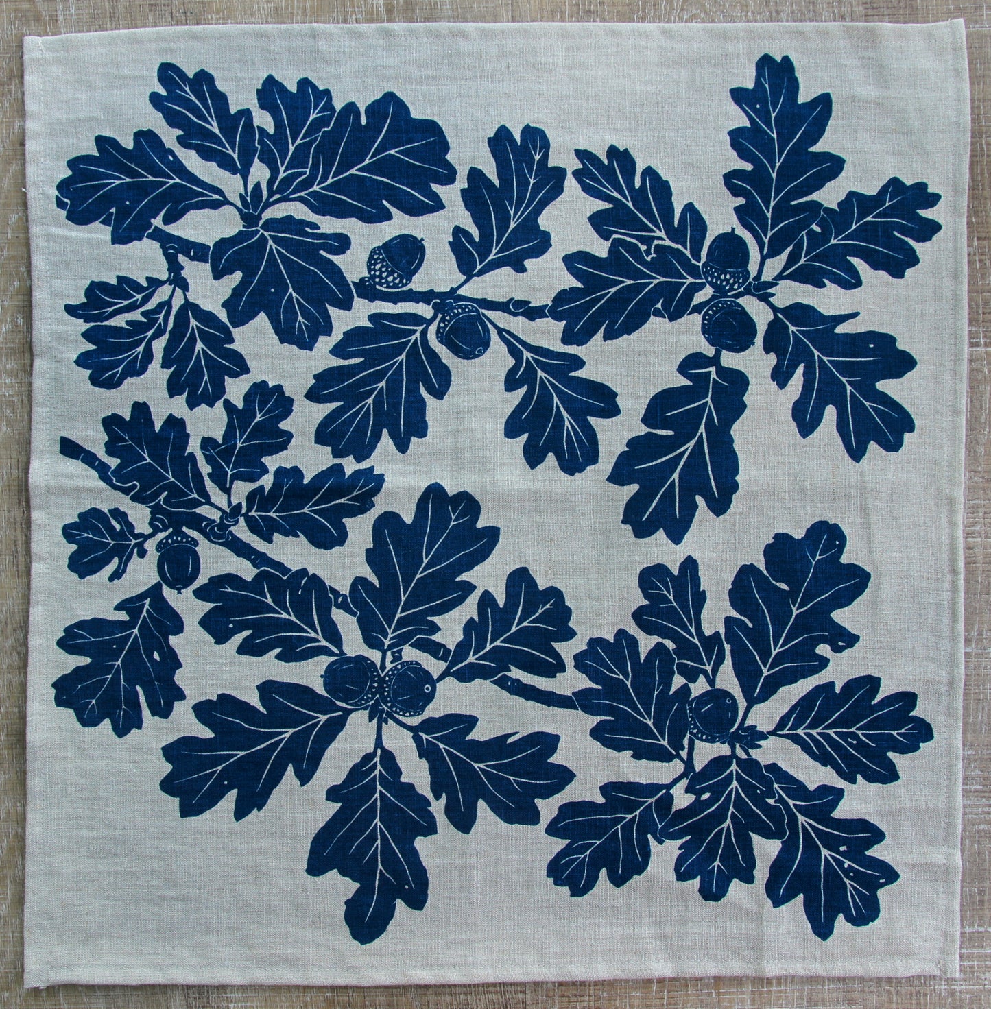 Garry Oak Napkin in Deep Marine on Natural Linen