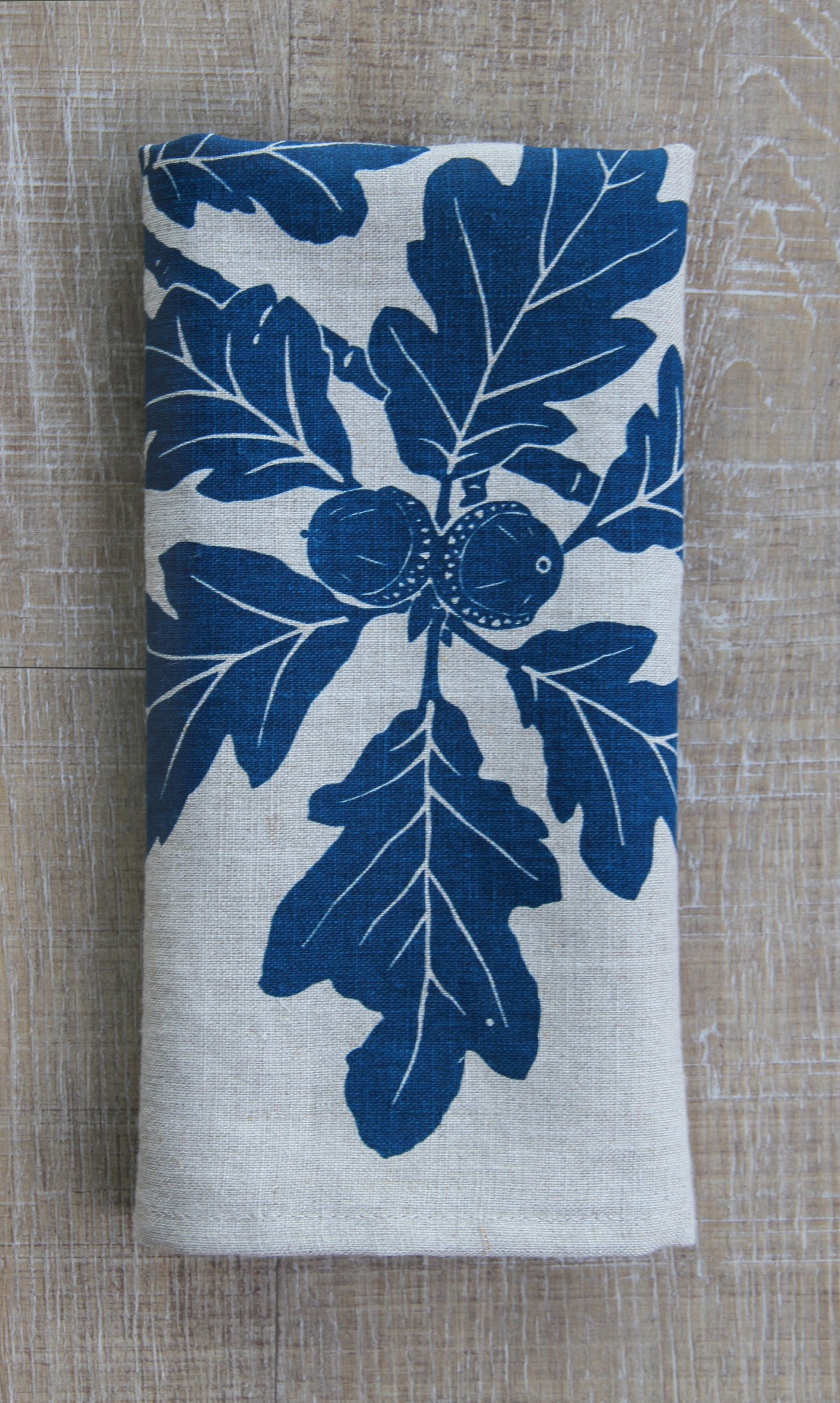Garry Oak Napkin in Deep Marine on Natural Linen