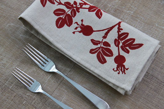 Nootka Rose Hip Napkin in Ruby on Natural Linen