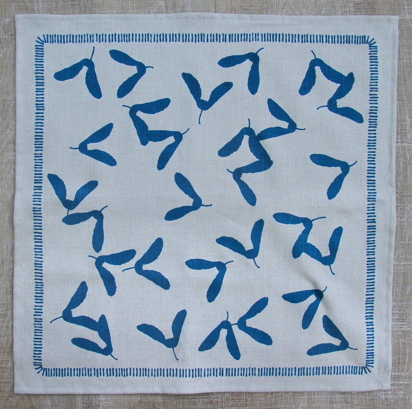 Samara Napkin in Pool on Natural Linen