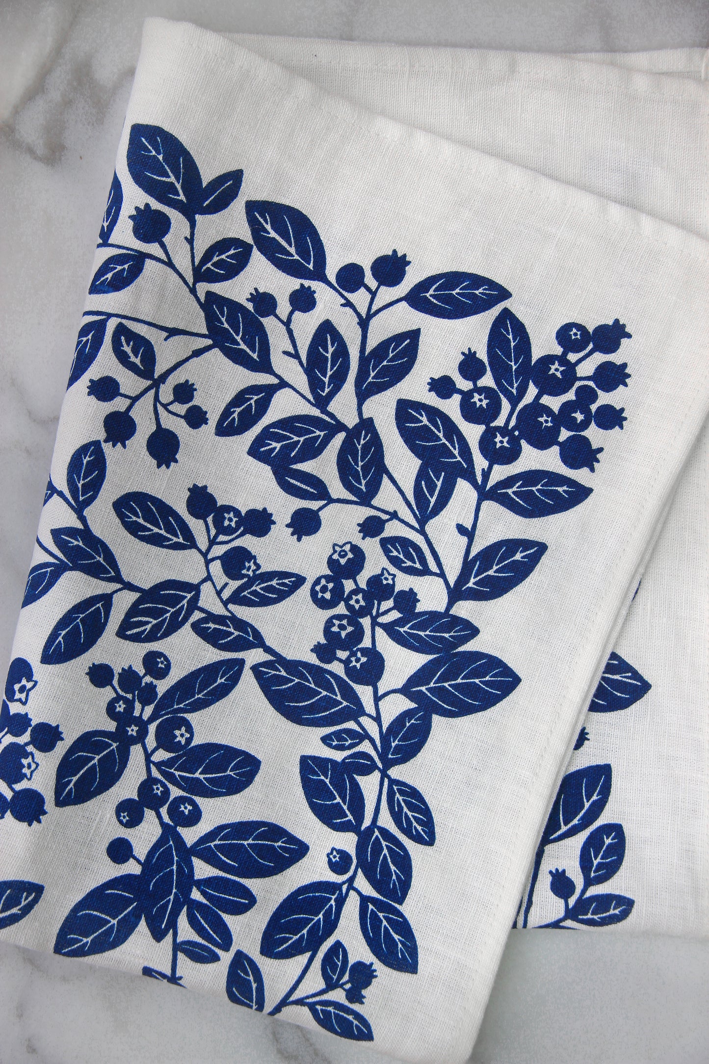 Blueberry Kitchen Towel in Blueberry Pie on White Linen