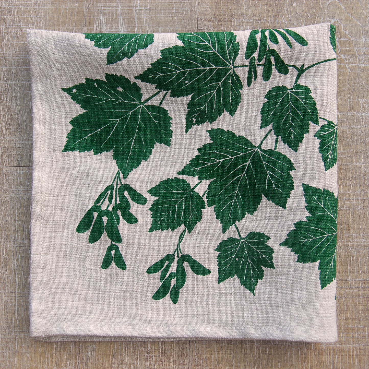 Douglas Maple Napkin in Shady Leaf on Natural Linen