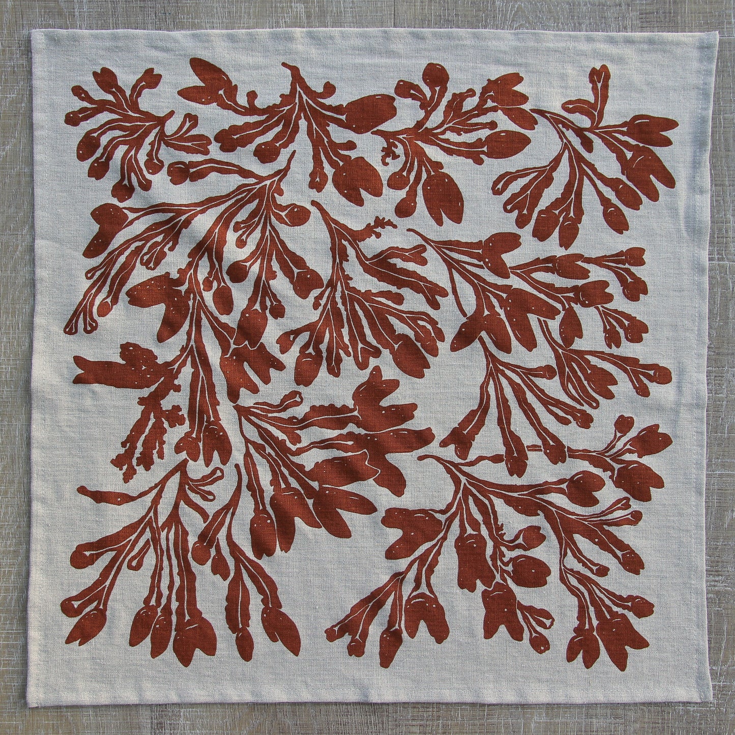 Seaweed Napkin in Red Ochre on Natural Linen