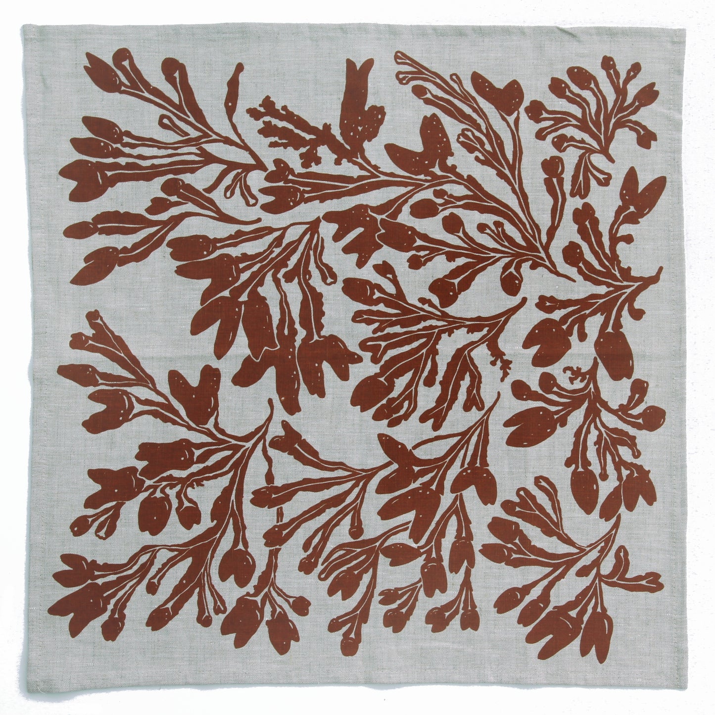 Seaweed Napkin in Sienna on Linen