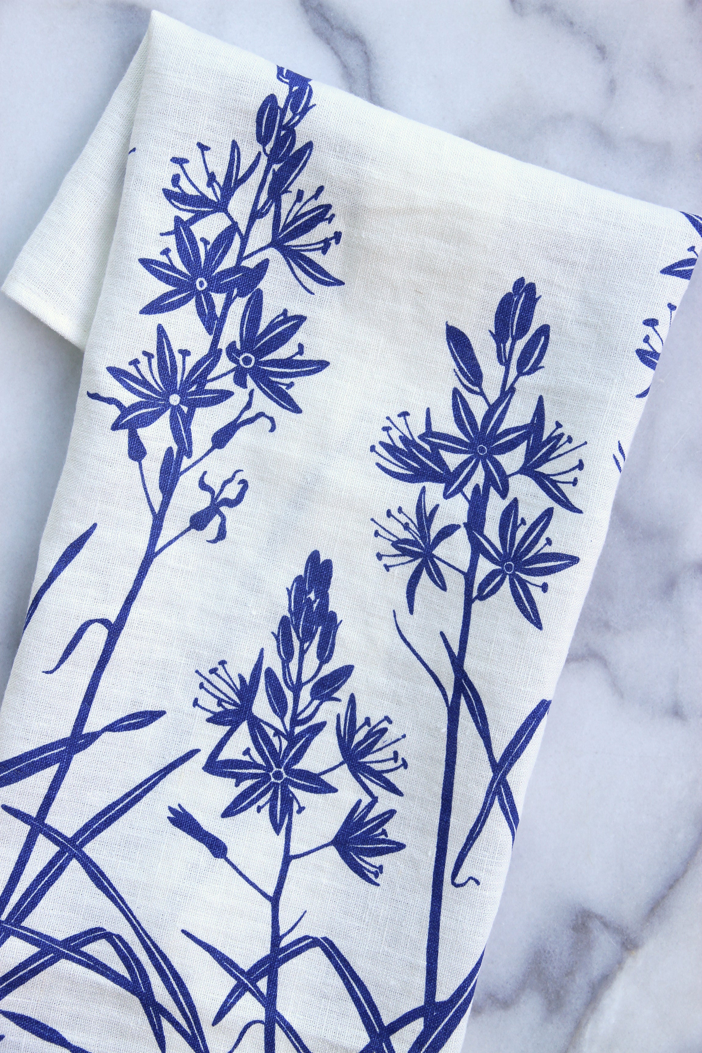 Camas Kitchen Towel in Periwinkle on White Linen Woodsia