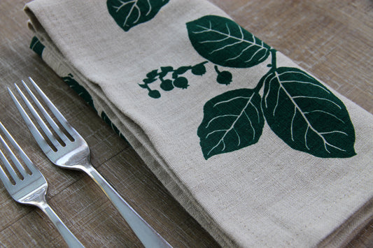Salal Napkin in Hunter Green on Natural Linen