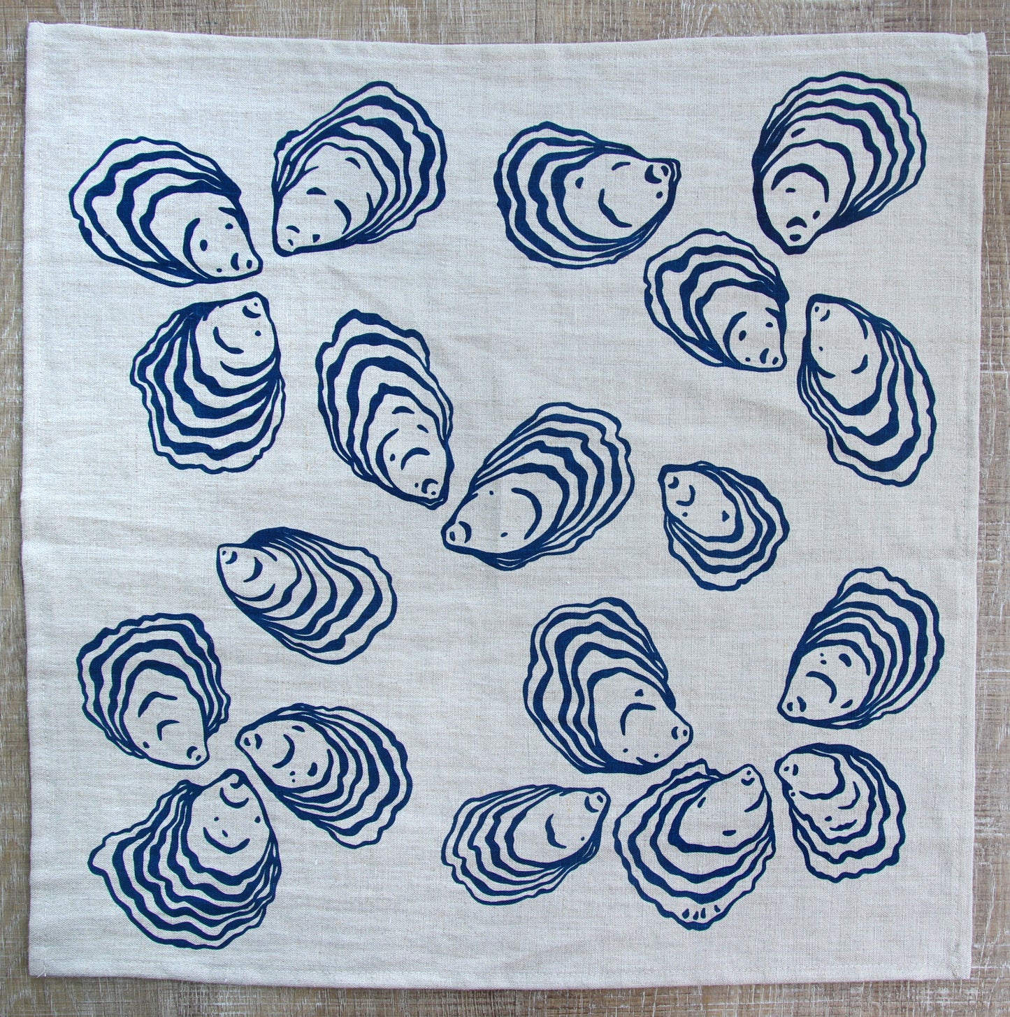 Oyster Napkin in Deep Marine on Natural Linen