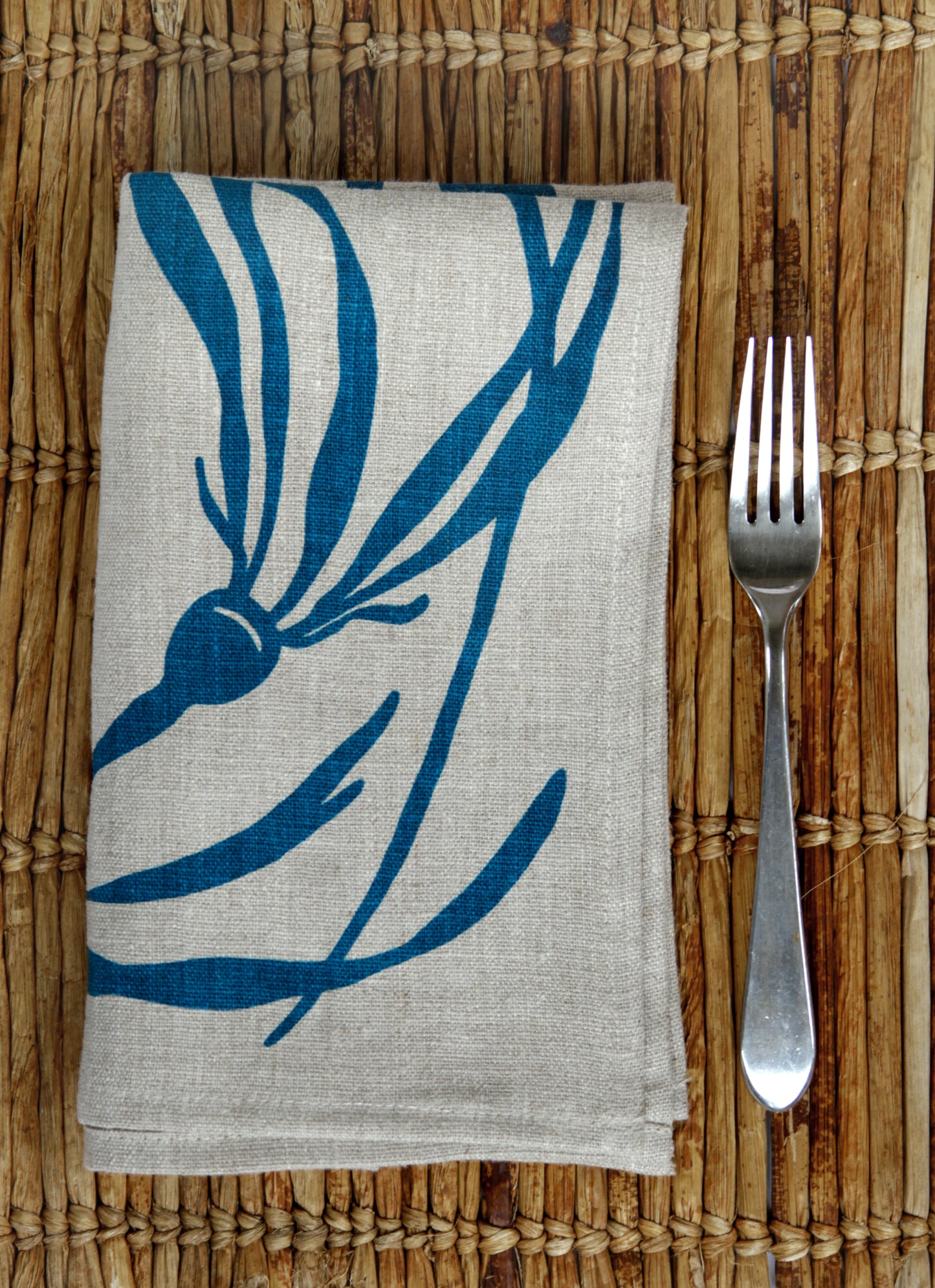 Kelp Napkin in Pool on Natural Flax Linen