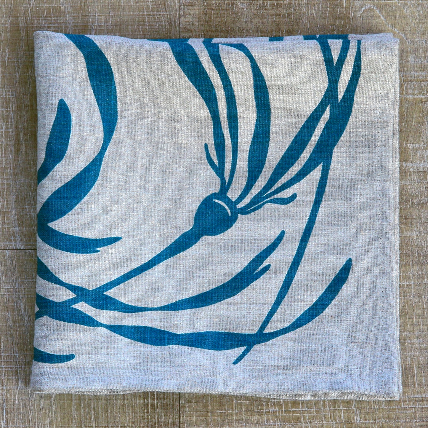 Kelp Napkin in Pool on Natural Flax Linen
